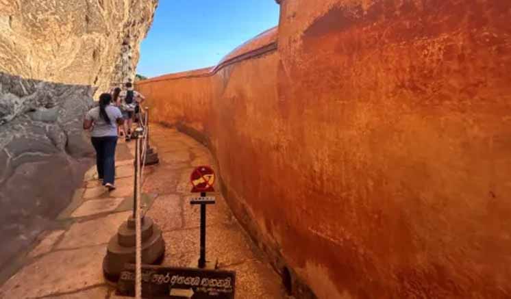 21-year-old woman arrested for defacing Sigiriya Mirror Wall